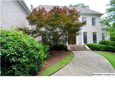 Home shows off beautiful white brick.