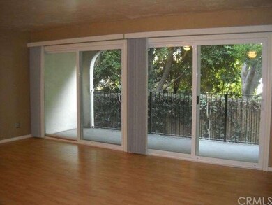 Large Living Room with two sets of Sliding doors t
