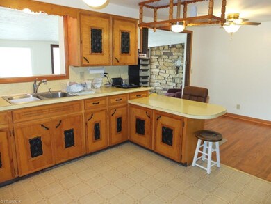 Another view of kitchen overlooking the family roo
