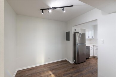 Kitchen with decorative backsplash, stainless stee