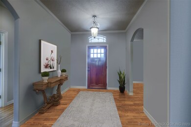 entryway slightly modified w/ virtual staging
