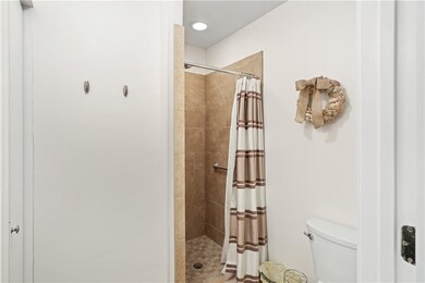 Guest Bath with tile shower.
