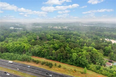 I-575 in the foreground.  Facing Northeast.  377 feet of I-575 frontage