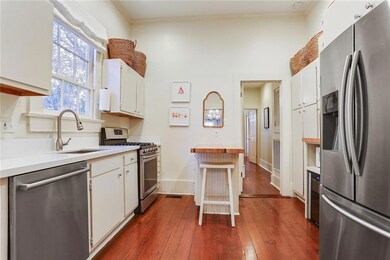 KITCHEN -- STAINLESS STEEL APPLIANCES, QUARTZ ARIE