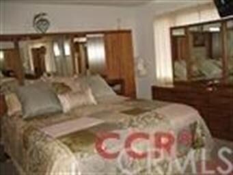 This bedroom can hold large furniture!  There is a