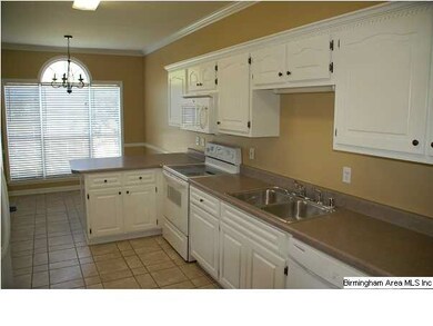 Large kitchen with plenty of cabinets and counter 