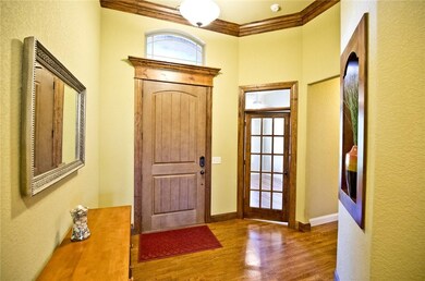 Solid wood front door, with office (or could be a 4th bedroom if needed, would make a great guest bedroom) directly off the front door.