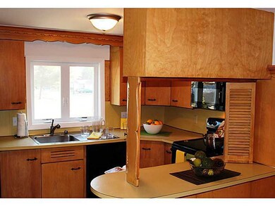 Kitchen. Kitchen opens to dining room.