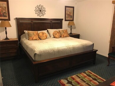 Large Master Bedroom has entrance to the sun porch