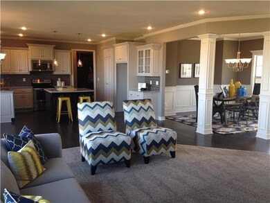 Open floor plan with great room, kitchen, and dini