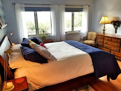 Wooden flooring in the bedroom is stylish and a qu