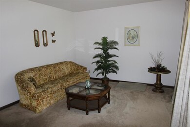 The living room welcomes you to the home.
