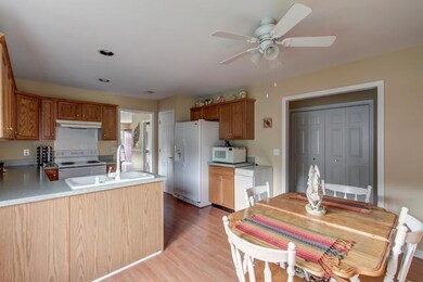 The kitchen also has an electric stove/oven, dishwasher and wood floors.  
