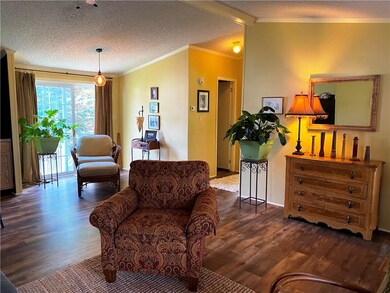 Hallway leads to 2 bedrooms and shared full bath.