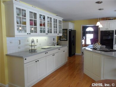 Kitchen. LOTS OF CABINETS AND LIGHT!  EXTRA SINK O