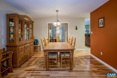 Large dining room with maple hardwood flooring.  F