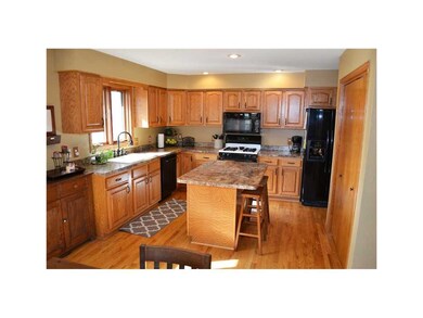 Kitchen. Updated kitchen with hardwood floors, hig