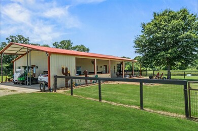 Built-in carport and expansive porches will welcom