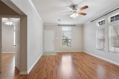 LOOKING TOWARD FRONT DOOR IN LIVING ROOM... NOTE L