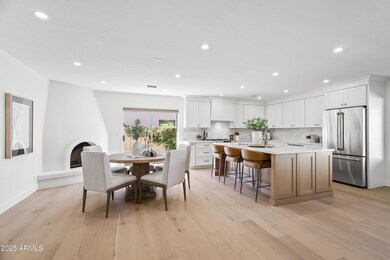 GOURMET KITCHEN + DINING & FIREPLACE