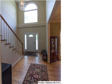 Large foyer leads into the formal dining.