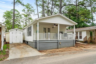View of front of house featuring ceiling fan