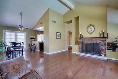 Two-Way Fireplace with Stacked Stone
