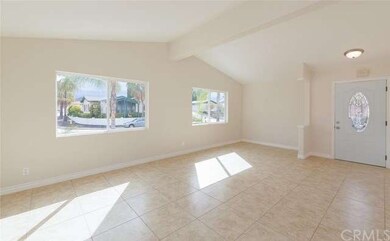 Large Living Room area with leaded glass front doo