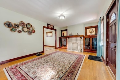 Living room with hardwood floors and built ins!
