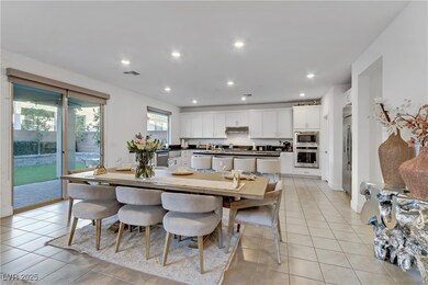 Dining room featuring light tile patterned floors,