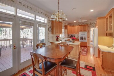 Kitchen and breakfast area opens to deck.