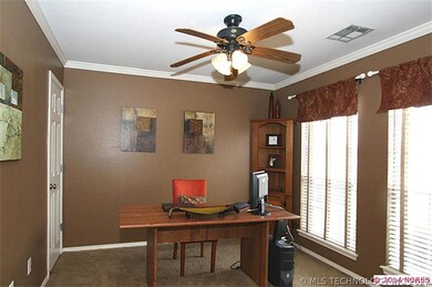 To the right of the entry is an office or it could