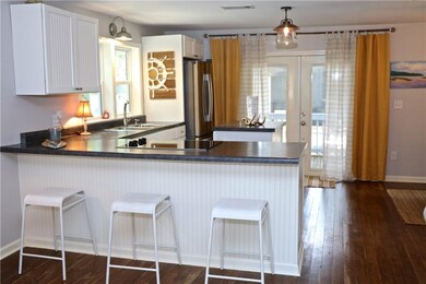 New refrigerator, new oven, stove top and microwav