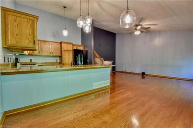 Kitchen and eating area featuring granite countert
