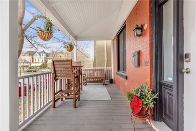 This fun yet functional (newer) front porch is the