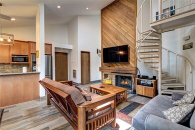 Cozy living room with wood burning fireplace