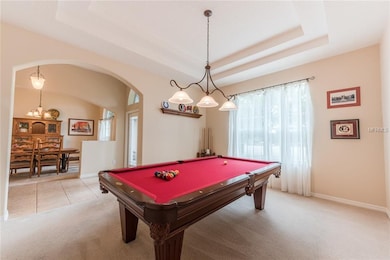 Living area with tray ceilings currently being use