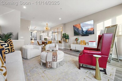 Living area featuring a chandelier, wood finished floors, and recessed lighting