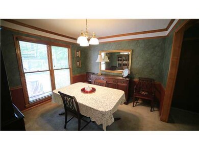 Elegant crown molding and chair rail in the formal