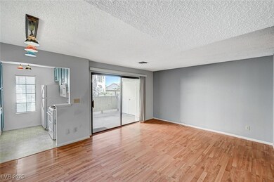 Spare room with light wood-type flooring, baseboar