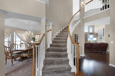 Grand entry with a sweeping staircase (imagine the holiday photos here!)