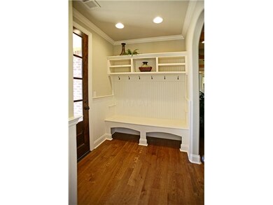 Custom wood bench & hooks in mud room