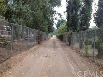 Back Entry view of Venado Rd. leads to rear of lot