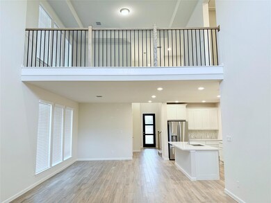 Unfurnished living room featuring light wood fini