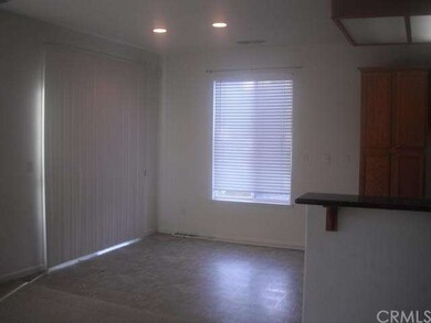Eating area off kitchen.  Slider to back yard.