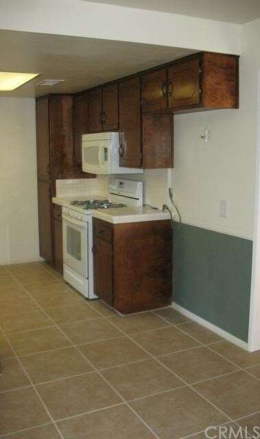 Kitchen with new tile flooring.