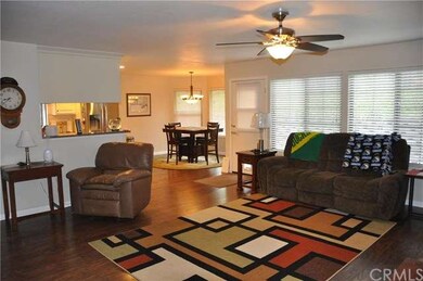 Living room with vies of dining room.