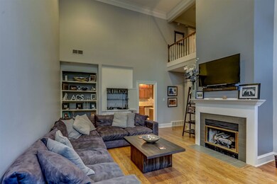 Ideal Family Room also features tile fireplace wit