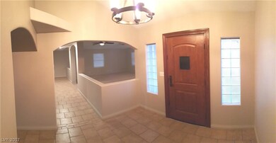 Entryway with New Front Door & Light. Tile Through