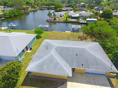 6,000 lb. covered boat lift, dock & davits.